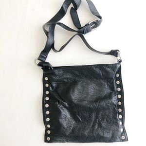 Black Leather sling bag.